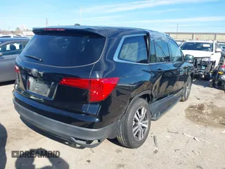 2018 Honda Pilot EX-L with VIN 5FNYF5H59JB030759, listed as a IAAI auction lot 41323545 with 89,689 mi miles. Bid and sale history available at carsss.com. Image 4.