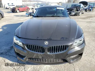 2011 BMW Z4 sDrive35is with VIN WBALM1C58BE393909, listed as a Copart auction lot 89218305 with 112,502 mi miles and Salvage Title. Bid and sale history available at carsss.com. Image 5.