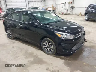 2022 Kia Rio S with VIN 3KPA24AD6NE454842, listed as a IAAI auction lot 41921650 with 28,265 mi miles. Bid and sale history available at carsss.com. Image 1.