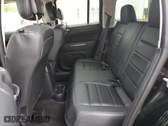 2014 Jeep Patriot Limited with VIN 1C4NJRCB7ED801688, listed as a Copart auction lot 55704485 with 107,867 mi miles and Salvage title. Bid and sale history available at DreamBid. Image 11.