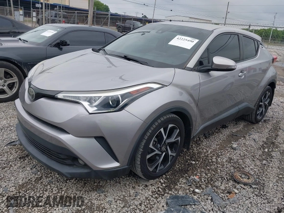 2018 Toyota C-HR XLE with VIN NMTKHMBXXJR031420, listed as a IAAI auction lot 42225490 with 80,628 mi miles and . Bid and sale history available at DreamBid. Image 2.