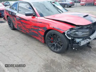 2020 Dodge Charger Scat Pack Widebody z VIN 2C3CDXGJ5LH101144, wystawiony jako IAAI lot #42218066 z przebiegiem 52 844 mil mil oraz . Historia ofert i sprzedaży dostępna na DreamBid. Obrazek 1.