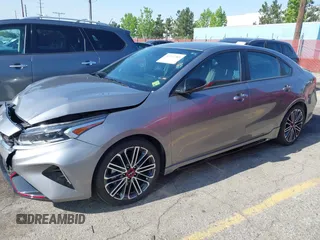 2024 Kia Forte GT z VIN 3KPF44AC7RE802984, wystawiony jako IAAI lot #42147389 z przebiegiem 7018 mil mil oraz . Historia ofert i sprzedaży dostępna na DreamBid. Obrazek 14.