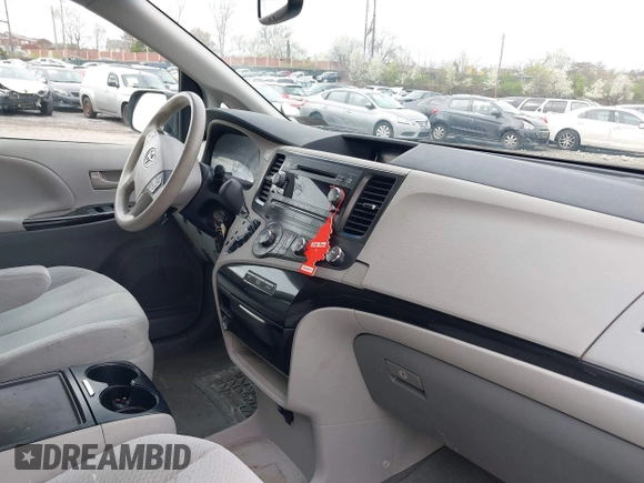 2012 Toyota Sienna LE AAS with VIN 5TDKK3DC9CS227584, listed as a IAAI auction lot 41972758 with 258,077 mi miles. Bid and sale history available at carsss.com. Image 5.