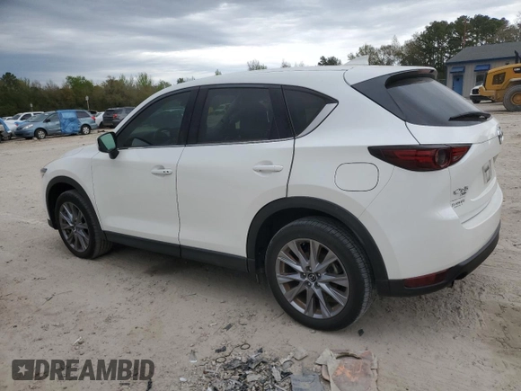 2021 Mazda CX-5 Grand Touring Reserve with VIN JM3KFBAY5M0320404, listed as a Copart auction lot 50405075 with 32,596 mi miles and Salvage Title. Bid and sale history available at carsss.com. Image 2.
