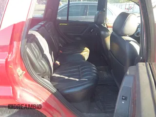 2000 Jeep Grand Cherokee Limited with VIN 1J4GW58N5YC186410, listed as a IAAI auction lot 42504152 with 140,982 mi miles and . Bid and sale history available at DreamBid. Image 8.