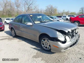 2003 Mercedes-Benz E-Class 3.2L with VIN WDBUF65J93X099223, listed as a IAAI auction lot 42033473 with 230,758 mi miles. Bid and sale history available at carsss.com. Image 1.