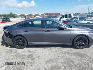 2022 Honda Accord Touring with VIN 1HGCV3F91NA031010, listed as a IAAI auction lot 40302407 with 18,820 mi miles and . Bid and sale history available at DreamBid. Image 13.