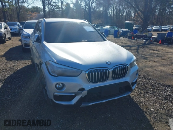 2018 BMW X1 xDrive28i with VIN WBXHT3C30J5L29757, listed as a IAAI auction lot 41879504 with 60,490 mi miles. Bid and sale history available at carsss.com. Image 12.