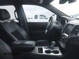 2018 Jeep Grand Cherokee Altitude with VIN 1C4RJEAGXJC281236, listed as a IAAI auction lot 42378899 with 102,276 mi miles and . Bid and sale history available at DreamBid. Image 5.