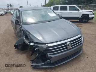 2021 Volkswagen Jetta S z VIN 3VWC57BU3MM067408, wystawiony jako IAAI lot #42099368 z przebiegiem 34 879 mil mil oraz . Historia ofert i sprzedaży dostępna na DreamBid. Obrazek 1.