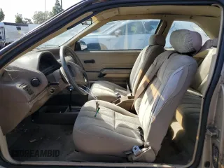 1989 Ford Tempo z VIN 1FAPP31X0KK113919, wystawiony jako Copart lot #76599314 z przebiegiem 65 823 mil mil oraz Tytuł czysty. Historia ofert i sprzedaży dostępna na DreamBid. Obrazek 7.