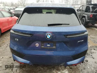 2023 BMW iX xDrive50 with VIN WB523CF09PCM04671, listed as a Copart auction lot 38947734 with 0 mi miles. Bid and sale history available at carsss.com. Image 6.