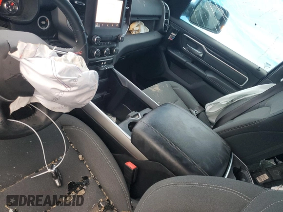 2023 Ram 1500 Big Horn z VIN 1C6RRFBG0PN567260, wystawiony jako Copart lot #42092775 z przebiegiem 16 860 mil mil oraz Nie do naprawy • Non repairable. Historia ofert i sprzedaży dostępna na DreamBid. Obrazek 8.