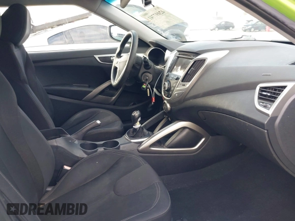 2012 Hyundai Veloster w/Gray Int z VIN KMHTC6AD3CU025315, wystawiony jako IAAI lot #42097741 z przebiegiem 146 726 mil mil oraz . Historia ofert i sprzedaży dostępna na DreamBid. Obrazek 5.