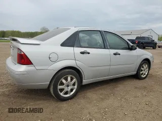 2007 Ford Focus S z VIN 1FAFP34N97W236303, wystawiony jako Copart lot #55248765 z przebiegiem 125 900 mil mil oraz Szkoda całkowita • Salvage title. Historia ofert i sprzedaży dostępna na DreamBid. Obrazek 3.