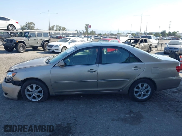 2005 Toyota Camry LE with VIN 4T1BF32K55U592479, listed as a IAAI auction lot 41974250 with 184,767 mi miles and . Bid and sale history available at DreamBid. Image 14.
