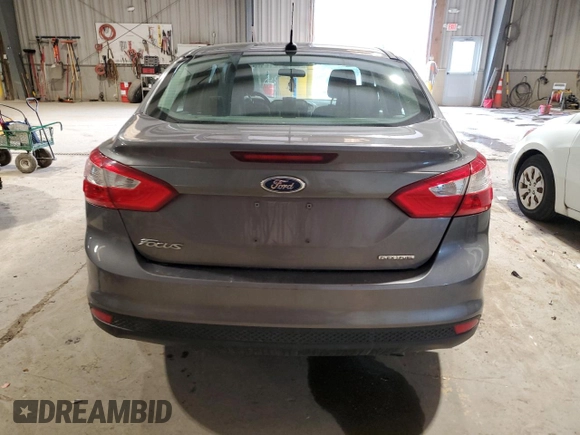 2013 Ford Focus S with VIN 1FADP3E21DL350613, listed as a Copart auction lot 52401695 with 125,828 mi miles and Salvage Title. Bid and sale history available at carsss.com. Image 6.