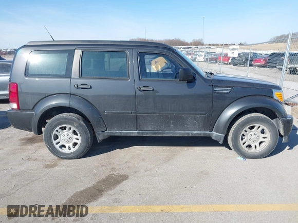 2011 Dodge Nitro SE z VIN 1D4PT2GK7BW520224, wystawiony jako IAAI lot #41781346 z przebiegiem 152 140 mil mil oraz . Historia ofert i sprzedaży dostępna na DreamBid. Obrazek 13.