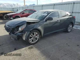 2011 Kia Optima EX z VIN KNAGN4A74B5174210, wystawiony jako Copart lot #88235885 z przebiegiem 189 657 mil mil oraz Szkoda całkowita • Salvage title. Historia ofert i sprzedaży dostępna na DreamBid. Obrazek 1.