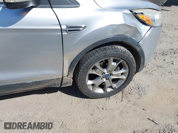2013 Ford Escape SEL with VIN 1FMCU9H94DUA25017, listed as a IAAI auction lot 41976238 with 171,885 mi miles and . Bid and sale history available at DreamBid. Image 6.