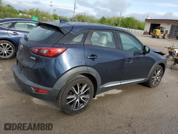 2017 Mazda CX-3 Grand Touring z VIN JM1DKFD75H0141048, wystawiony jako Copart lot #55752185 z przebiegiem 89 960 mil mil oraz Szkody całkowita. Historia ofert i sprzedaży dostępna na DreamBid. Obrazek 3.