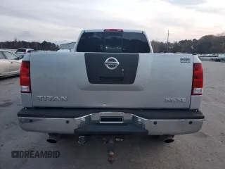 2005 Nissan Titan SE with VIN 1N6BA06B45N539629, listed as a Copart auction lot 82527074 with 154,255 mi miles and Salvage title. Bid and sale history available at DreamBid. Image 6.