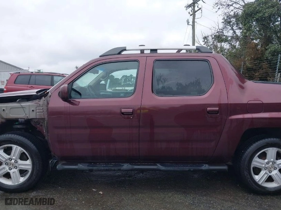 2009 Honda Ridgeline RTL with VIN 5FPYK16559B103698, listed as a IAAI auction lot 41479390 with 144,554 mi miles. Bid and sale history available at carsss.com. Image 14.