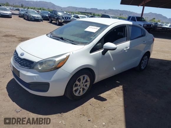 2013 Kia Rio LX with VIN KNADM4A32D6211593, listed as a IAAI auction lot 42142098 with 224,858 mi miles and . Bid and sale history available at DreamBid. Image 2.