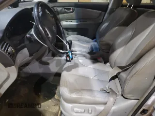 2007 Kia Optima EX with VIN KNAGE124675137864, listed as a Copart auction lot 87433434 with 141,682 mi miles and Salvage Title. Bid and sale history available at carsss.com. Image 7.