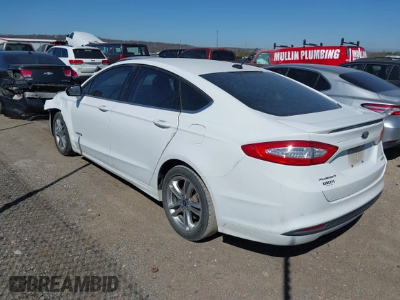 2016 Ford Fusion SE Hybrid with VIN 3FA6P0LU1GR127280, listed as a IAAI auction lot 41754682 with 194,357 mi miles. Bid and sale history available at carsss.com. Image 3.