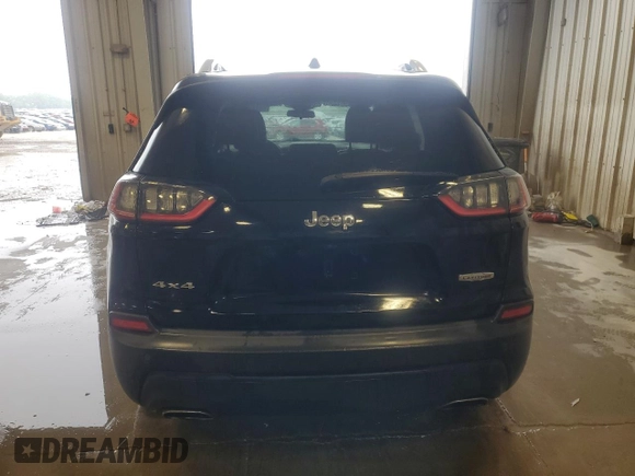 2019 Jeep Cherokee Altitude with VIN 1C4PJMLX5KD386597, listed as a Copart auction lot 59132655 with 129,243 mi miles and Salvage title. Bid and sale history available at DreamBid. Image 6.