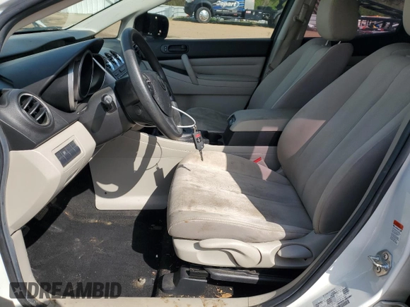2011 Mazda CX-7 i SV z VIN JM3ER2A57B0382295, wystawiony jako Copart lot #51141015 z przebiegiem 166 680 mil mil oraz Szkoda całkowita • Salvage title. Historia ofert i sprzedaży dostępna na DreamBid. Obrazek 7.