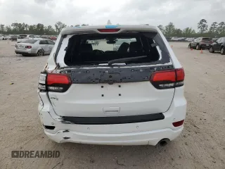 2018 Jeep Grand Cherokee Laredo E z VIN 1C4RJEAG3JC168390, wystawiony jako Copart lot #51808345 z przebiegiem 111 974 mil mil oraz Szkoda całkowita • Salvage title. Historia ofert i sprzedaży dostępna na DreamBid. Obrazek 6.