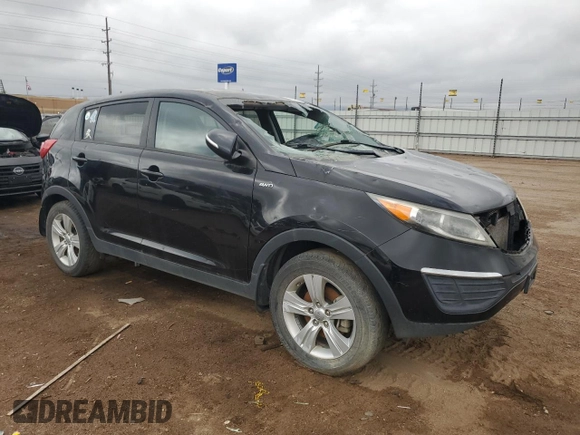 2013 Kia Sportage LX z VIN KNDPBCA25D7450010, wystawiony jako Copart lot #54597815 z przebiegiem 110 980 mil mil oraz Czysty tytuł • Clean title. Historia ofert i sprzedaży dostępna na DreamBid. Obrazek 4.