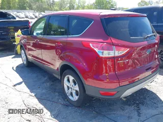 2016 Ford Escape SE with VIN 1FMCU9GX9GUC71209, listed as a IAAI auction lot 42037642 with 82,521 mi miles and . Bid and sale history available at DreamBid. Image 3.