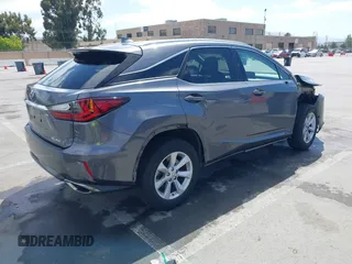 2017 Lexus RX 350 z VIN 2T2ZZMCA7HC035348, wystawiony jako IAAI lot #42357182 z przebiegiem 88 934 mil mil oraz . Historia ofert i sprzedaży dostępna na DreamBid. Obrazek 4.