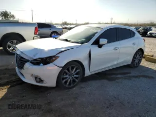 2016 Mazda 3 S Touring with VIN JM1BM1M36G1321438, listed as a Copart auction lot 47733425 with 126,472 mi miles and Salvage title. Bid and sale history available at DreamBid. Image 1.