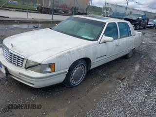 1999 Cadillac DeVille z VIN 1G6KD54Y5XU780836, wystawiony jako IAAI lot #41986180 z przebiegiem Nie podano mil oraz . Historia ofert i sprzedaży dostępna na DreamBid. Obrazek 2.