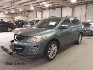 2012 Mazda CX-9 Grand Touring with VIN JM3TB3DV6C0360304, listed as a IAAI auction lot 41509627 with 163,986 mi miles. Bid and sale history available at carsss.com. Image 2.