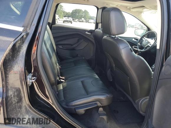 2013 Ford Escape Titanium z VIN 1FMCU0J93DUB60916, wystawiony jako Copart lot #61692595 z przebiegiem 169 691 mil mil oraz Szkoda całkowita • Salvage title. Historia ofert i sprzedaży dostępna na DreamBid. Obrazek 11.