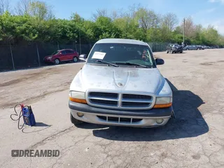 2001 Dodge Dakota SLT with VIN 1B7GG22XX1S348751, listed as a IAAI auction lot 42077395 with 148,034 mi miles and . Bid and sale history available at carsss.com. Image 13.