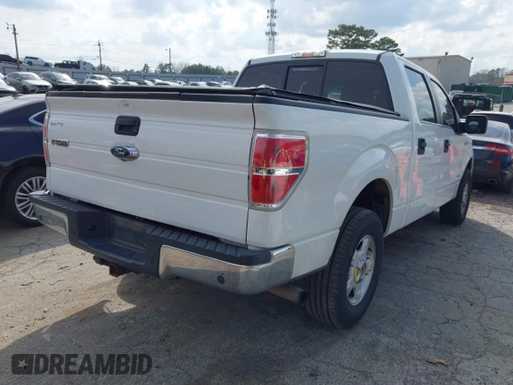 2014 Ford F-150 XL with VIN 1FTFW1CT5EKD39904, listed as a IAAI auction lot 41797099 with 209,343 mi miles. Bid and sale history available at carsss.com. Image 4.