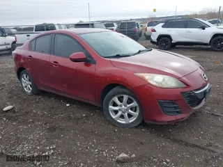 2010 Mazda Mazda3 i Touring with VIN JM1BL1SG1A1154017, listed as a IAAI auction lot 41801202 with 203,936 mi miles. Bid and sale history available at carsss.com. Image 1.