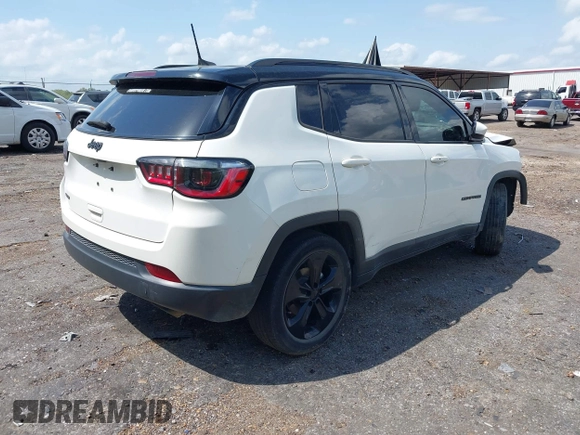 2021 Jeep Compass Altitude with VIN 3C4NJCBB8MT531586, listed as a IAAI auction lot 41941336 with 61,476 mi miles. Bid and sale history available at carsss.com. Image 4.