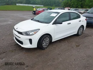 2018 Kia Rio LX with VIN 3KPA24ABXJE071866, listed as a IAAI auction lot 42099471 with 170,697 mi miles. Bid and sale history available at carsss.com. Image 2.
