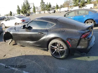 2022 Toyota GR Supra 3.0 with VIN WZ1DB0C04NW052244, listed as a Copart auction lot 82870654 with 63,592 mi miles and Salvage Title. Bid and sale history available at carsss.com. Image 2.