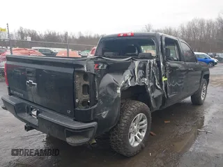 2018 Chevrolet Silverado 1500 LT with VIN 3GCUKREC5JG460979, listed as a IAAI auction lot 41741667 with 122,931 mi miles. Bid and sale history available at carsss.com. Image 4.