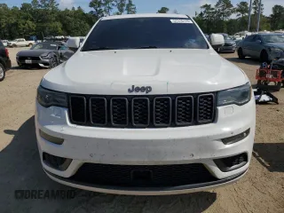 2018 Jeep Grand Cherokee High Altitude with VIN 1C4RJECG1JC260482, listed as a Copart auction lot 57310115 with 144,320 mi miles and Salvage title. Bid and sale history available at DreamBid. Image 5.