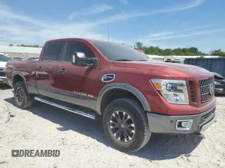 2017 Nissan Titan XD SV with VIN 1N6BA1F48HN516706, listed as a Copart auction lot 60725904 with 151,097 mi miles and Clean Title. Bid and sale history available at carsss.com. Image 4.
